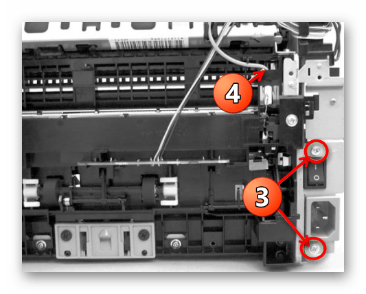 Отсоединение высоковольтного провода принтера Canon при его разборке
